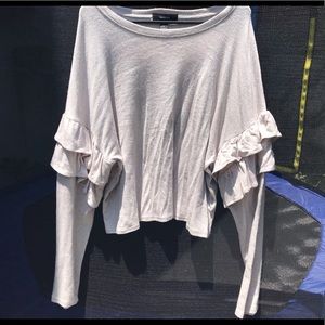 A brown ruffle long sleeve